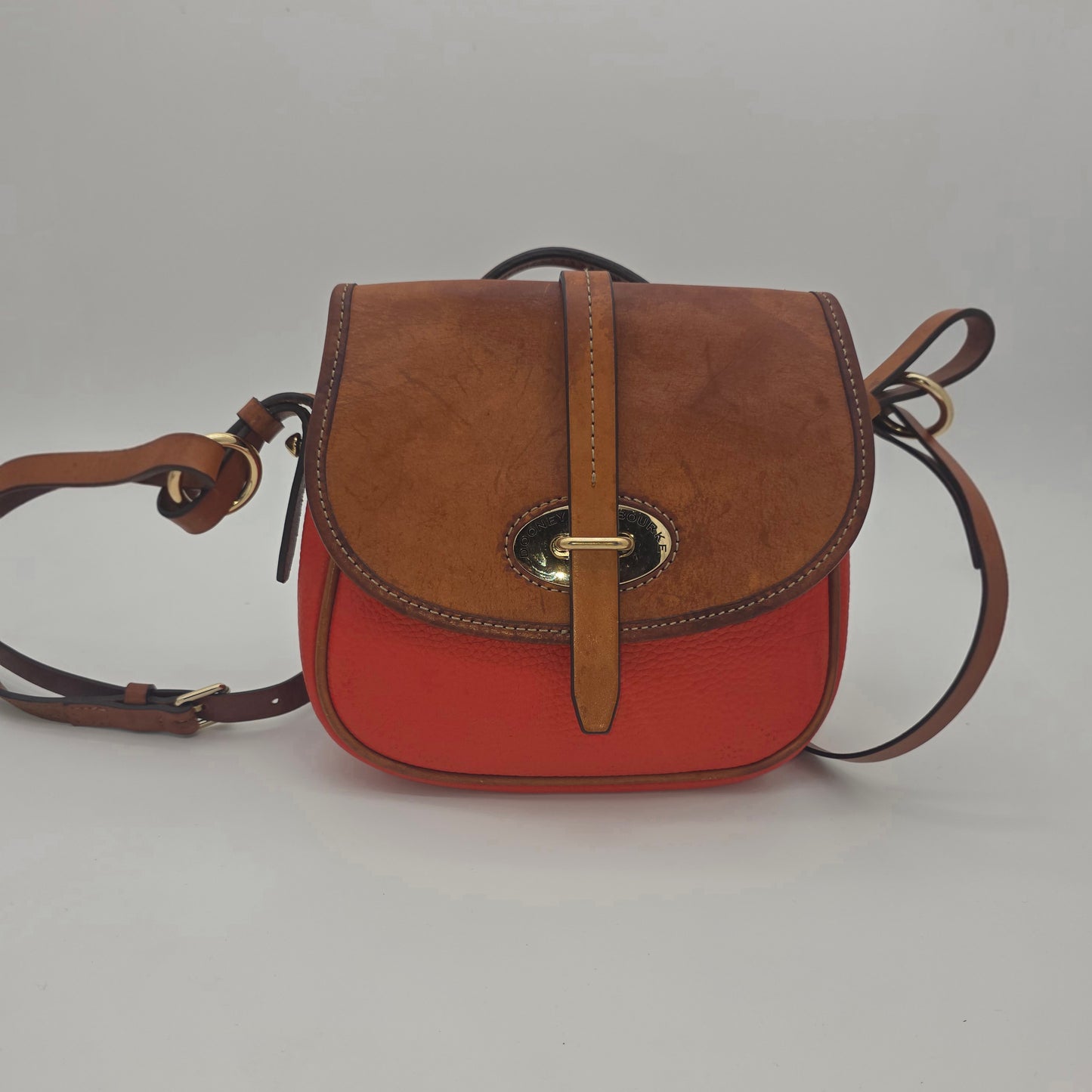 Dooney & Bourke Two-Tone Saddle Crossbody – Coral & Tan, Gold Hardware